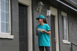 Volunteers distributing Drug-Free materials to Edgehill residents